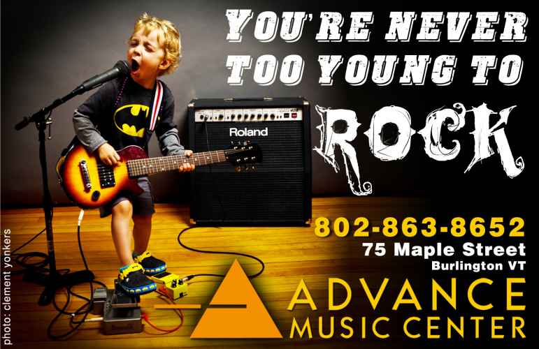 4 year old playing guitar